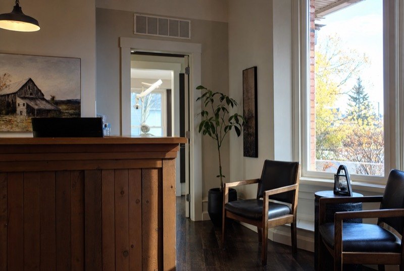 A calm reception area in a small dental clinic, the kind of practice dental SEO brings new patients to