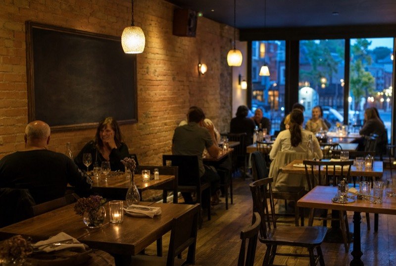 A warmly lit dining room in a heritage red-brick building, typical of the places restaurant SEO serves